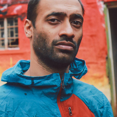 A man wearing blue jacket